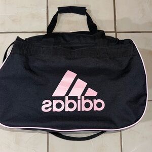 Adidas small duffle bag
Sold